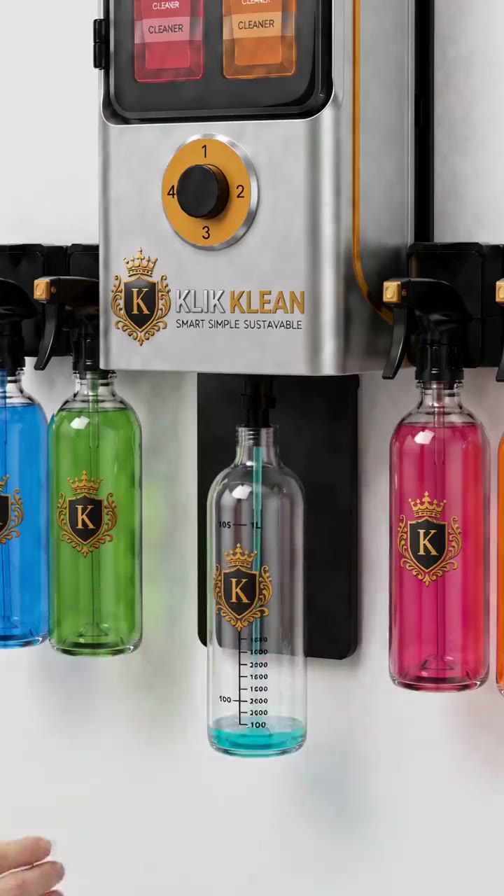 The Klik Klean wall-mounted dispenser with a row of filled spray bottles beneath it